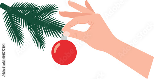 Hand decorating Christmas tree with red ornament