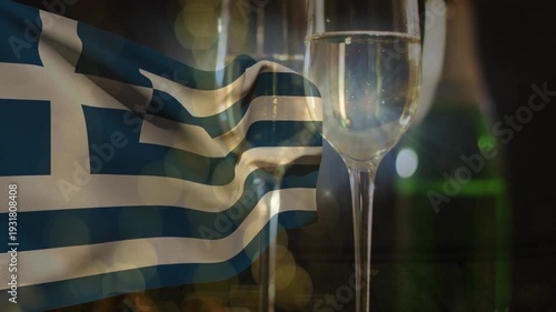 Focus shift initiating Greek flag rippling and champagne flute sparkling, creating festive scene