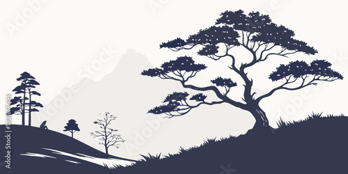 Silhouette of a large tree with smaller trees in the background on a hillside