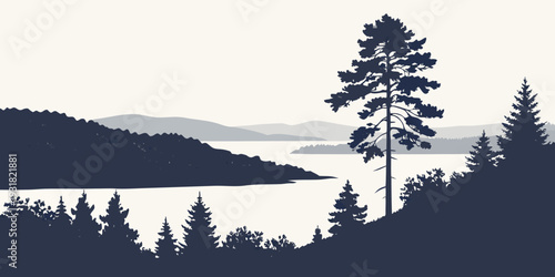 Majestic pine tree silhouette overlooking a serene mountain lake at dawn