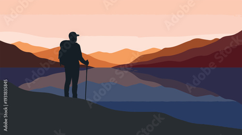 Silhouette of a hiker admiring a serene mountain lake at sunset