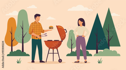 Couple having a barbecue picnic outdoors, grilling burgers with tongs
