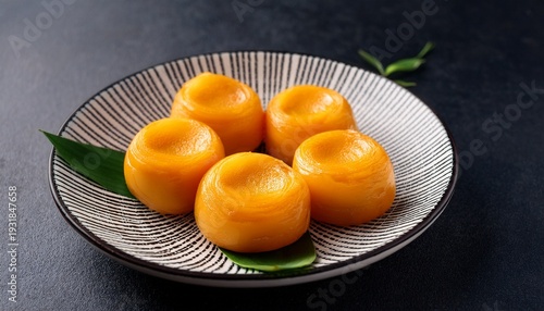 golden egg yolk sweets thong yip on ceramic plate
