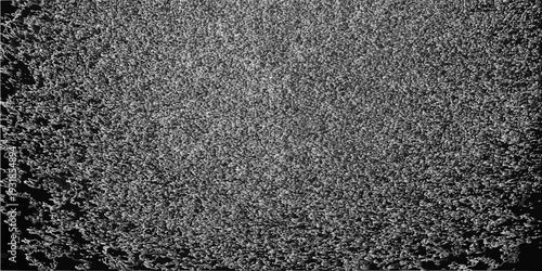 Rough black and white metal surface texture with a dark grunge pattern and closeup granite stone material backdrop