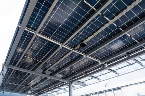 Bild auf Leinwand Bellow of solar cell panels, Solar on rooftop of building, Solar grid tie rooftop system