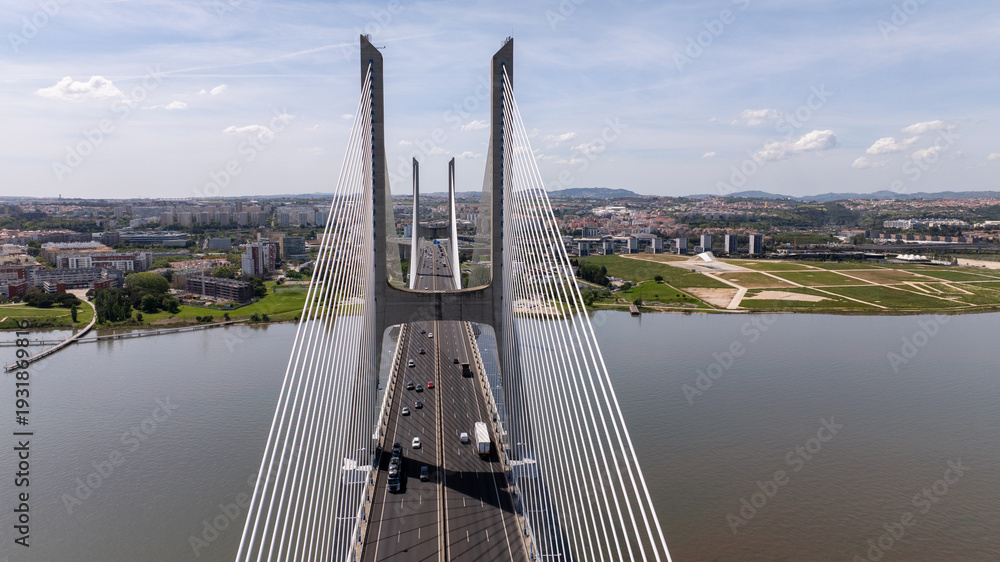 Obraz premium High angle view of cable stayed Vasco da Gama bridge over Tagus river in Lisbon city