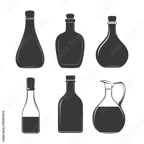 A Collection of Six Different Glass Bottles with Closures