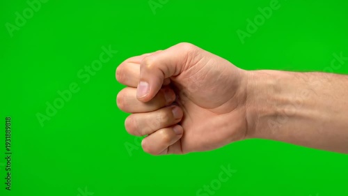 Hand performing knocking motion in air, isolated VIDEO footage on chroma key background