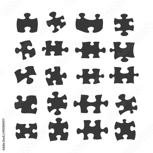 Collection of Twenty Puzzle Pieces in Black Silhouettes