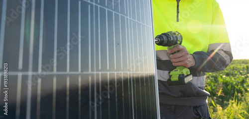 Wallpaper Mural A worker installs a solar panel. Torontodigital.ca