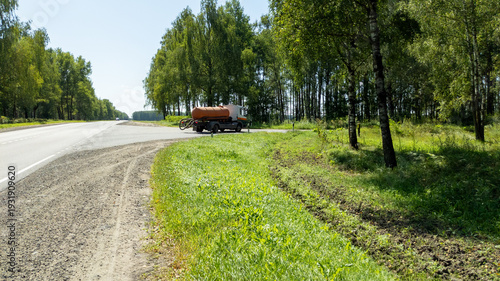 Photos Sewage truck turns onto the road to a farm
