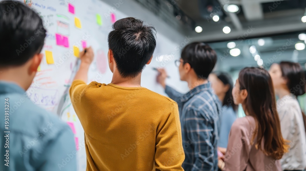 Obraz premium Dynamic Team Collaboration With Colorful Sticky Notes and Engaged Participants
