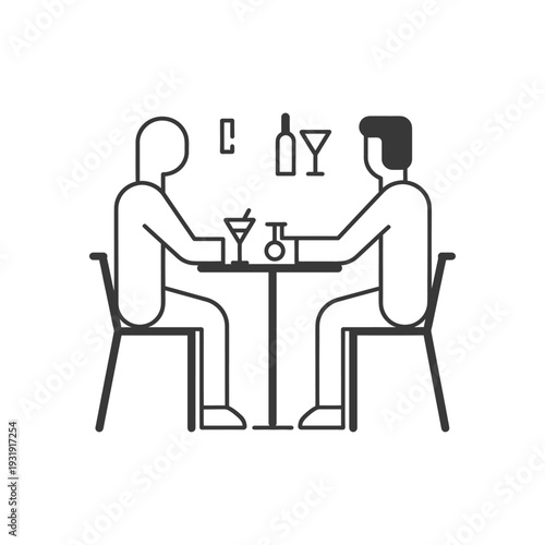 Two People Sitting at a Table with Drinks
