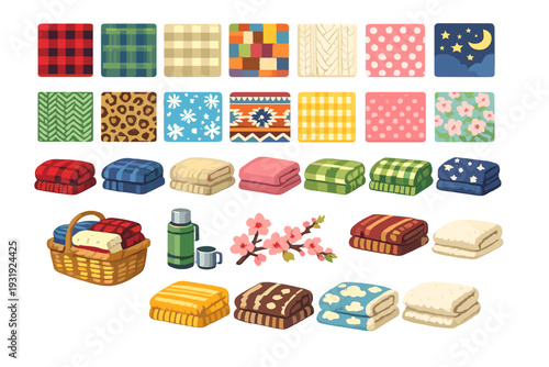 Various blanket designs and patterns arranged with a basket and a thermos on a simple background