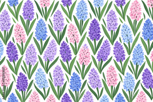 Colorful flowers arranged in a pattern with pink, purple, and blue hues set against a light background