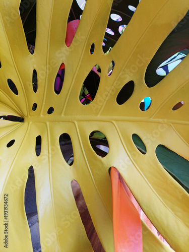 Colorful tropical background. Desktop wallpaper. Murals and painted flowers. Colorful Monstera leaves.