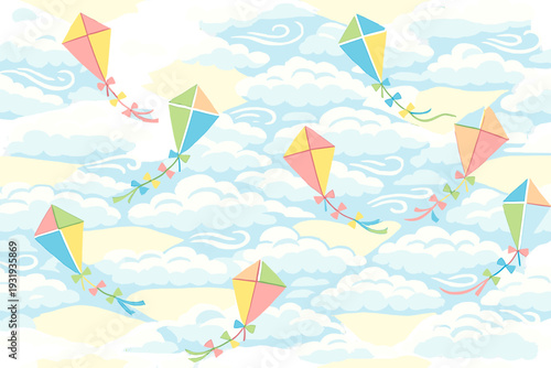 Colorful kites fly in the sky over soft clouds during a sunny day in a park