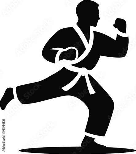 Martial arts athlete in white belt uniform kicks and punches  strong fitness training