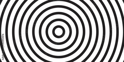 Black and white concentric circles forming a bold hypnotic pattern.