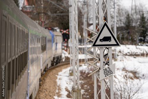 a train approaching a road crossing