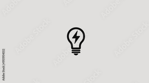 A simple, black lightbulb icon with a lightning bolt inside, centered on a gray background
