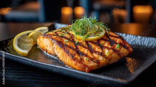 Delectable grilled salmon fillet seasoned with herbs and lemon, beautifully presented for a gourmet dining experience.