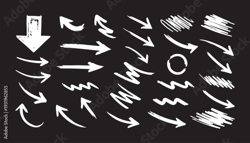 A versatile collection of hand-drawn white chalk arrows and scribbled pointers set against a dark background. Includes various styles such as curved, straight and zigzag markers.