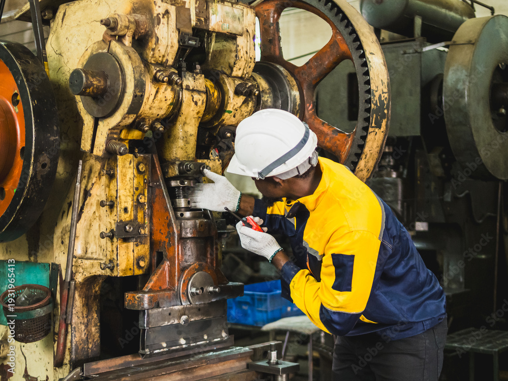 Fototapeta premium Industrial engineer technician worker man with helmet and uniform safety vest look hand holding radio communication talk look inspection quality control production in manufactory industry technology