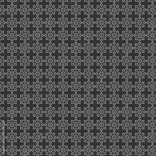 Seamless geometric pattern with floral motifs and diamond shapes