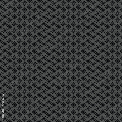 Repeating pattern of black eightpointed stars on grey background