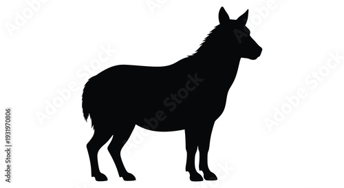 A striking black silhouette of a donky standing in profile silhouette