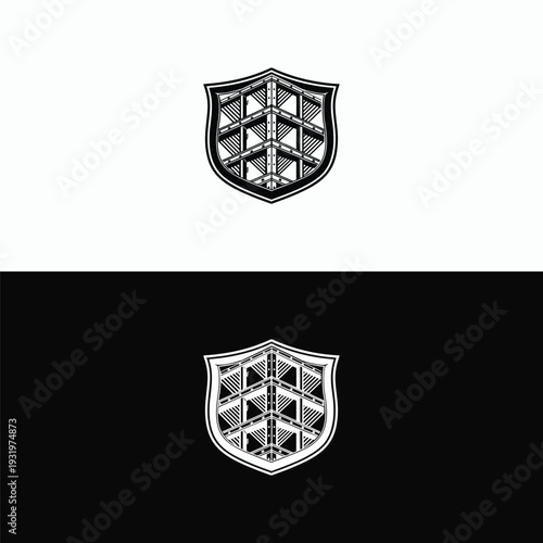 A sophisticated monochrome geometric shield logo featuring an intricate internal pattern of interconnected lines and triangular shapes.