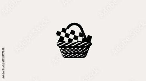 A simple, black-and-white illustration of a picnic basket containing a checkered pattern