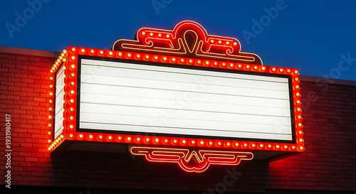Vintage movie theater sign at night