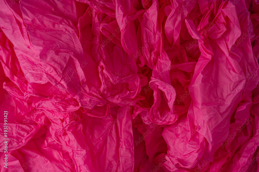 Fototapeta premium Pink latex sterile medical gloves as a background.