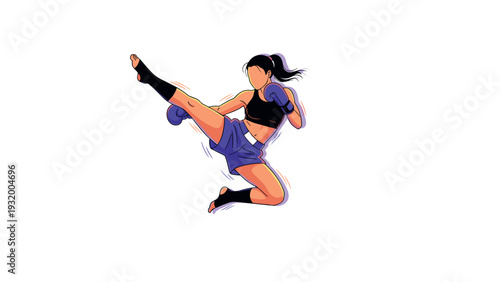 Dynamic female kickboxer in action with a powerful high kick