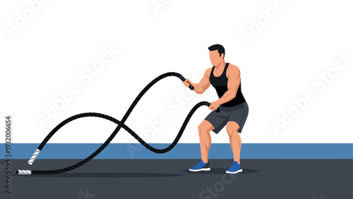 Athletic man exercising with battle ropes in minimalist fitness setting