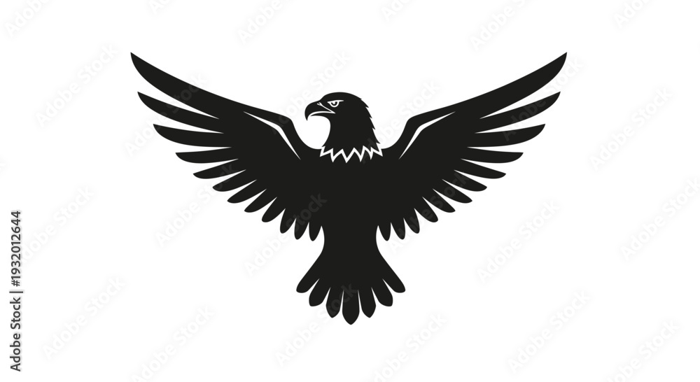 Fototapeta premium Silhouette of a soaring bird with outstretched wings in black against a stark white background