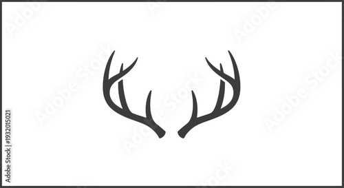 A symmetrical, stylized illustration of deer antlers, dark against a white background with a border