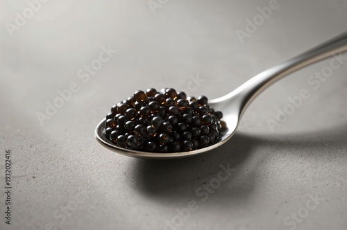 Wallpaper Mural Luxury caviar pearls displayed on elegant silver spoon with refined minimal background Torontodigital.ca