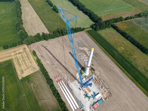 Photography A lattice boom crawler crane prepares for the installation of a new wind turbine