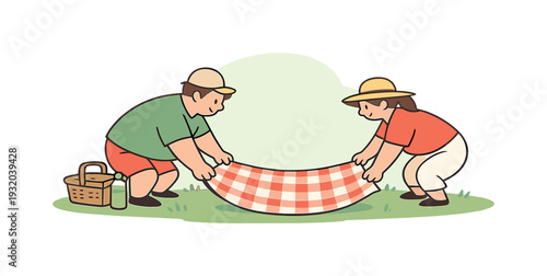 Couple preparing for a picnic by laying out a checkered blanket on the grass