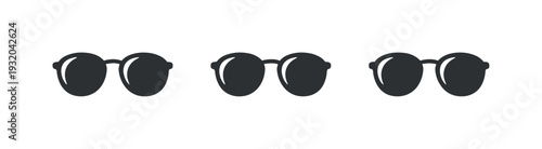 Casual enjoyment scene illustrated by a pair of sunglasses with rounded lenses and simple frame reduced to a clean icon,