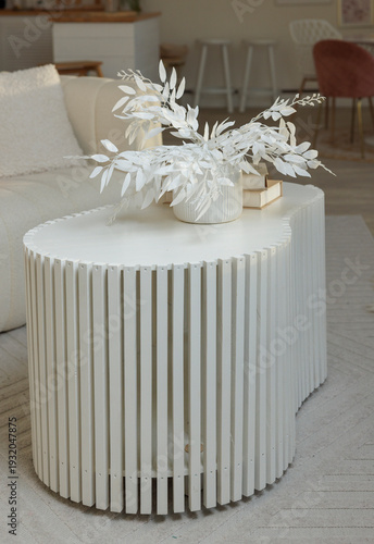 modern interior with a large window and a wooden table