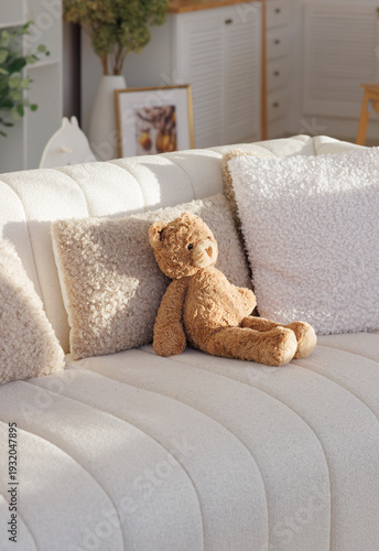 comfortable bear with teddy bear on sofa 