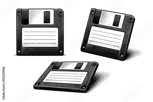 Floppy Disk ? label side view. A floppy disk emphasizing the label area and surface details, represented as the same disk displayed in three different views to