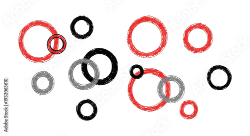 Abstract arrangement of overlapping hand drawn circles in red black and gray tones