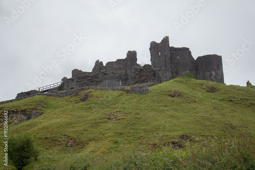 Canvastavla Ancient ruins of Carreg Cennen Castle on a rocky hill under an overcast sky, Car