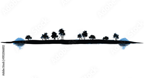 Silhouette of trees along a shoreline reflected in calm blue water