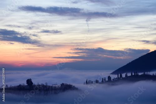 фотографія Sunset Over a Sea of Fog with the Euganean Hills Emerging in Soft Light and Atmo